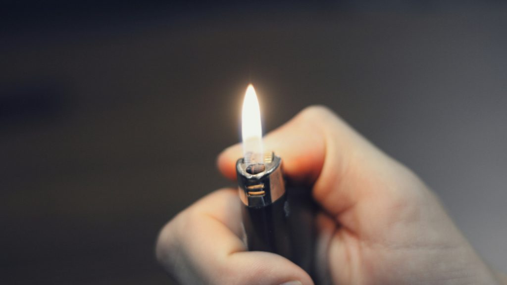 person-holding-black-lighter-0gmYLADpIzA